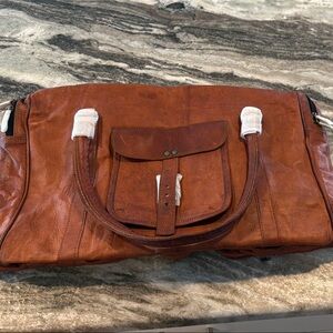 Komal’s Passion leather duffle bag. NEW
